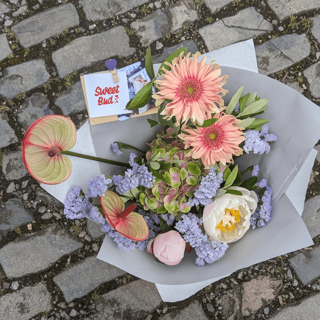 unusual, modern, flower bouquet with pink gerberas and tequila anthuriums