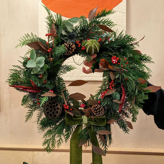 festive wreath made from nordic spruce and connifer